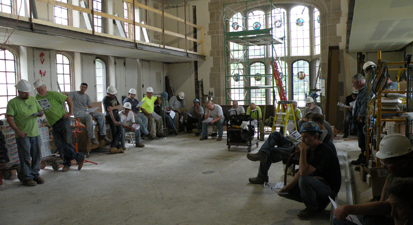 A construction company halted work to discuss fall safety on ladders and scaffolding at a restoration site in Illinois.