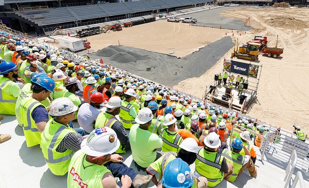 Workers in the stands at Turner Construction at D.C. United Audi Field Stadium, Washington, DC