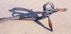 Figure 11. The constant rotation of this rope as it ran through the hoist has caused the free end to twist and split.