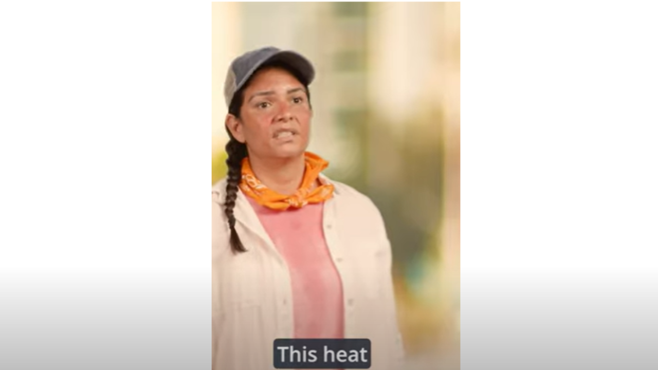 Capture from video of worker saying - 'This heat'