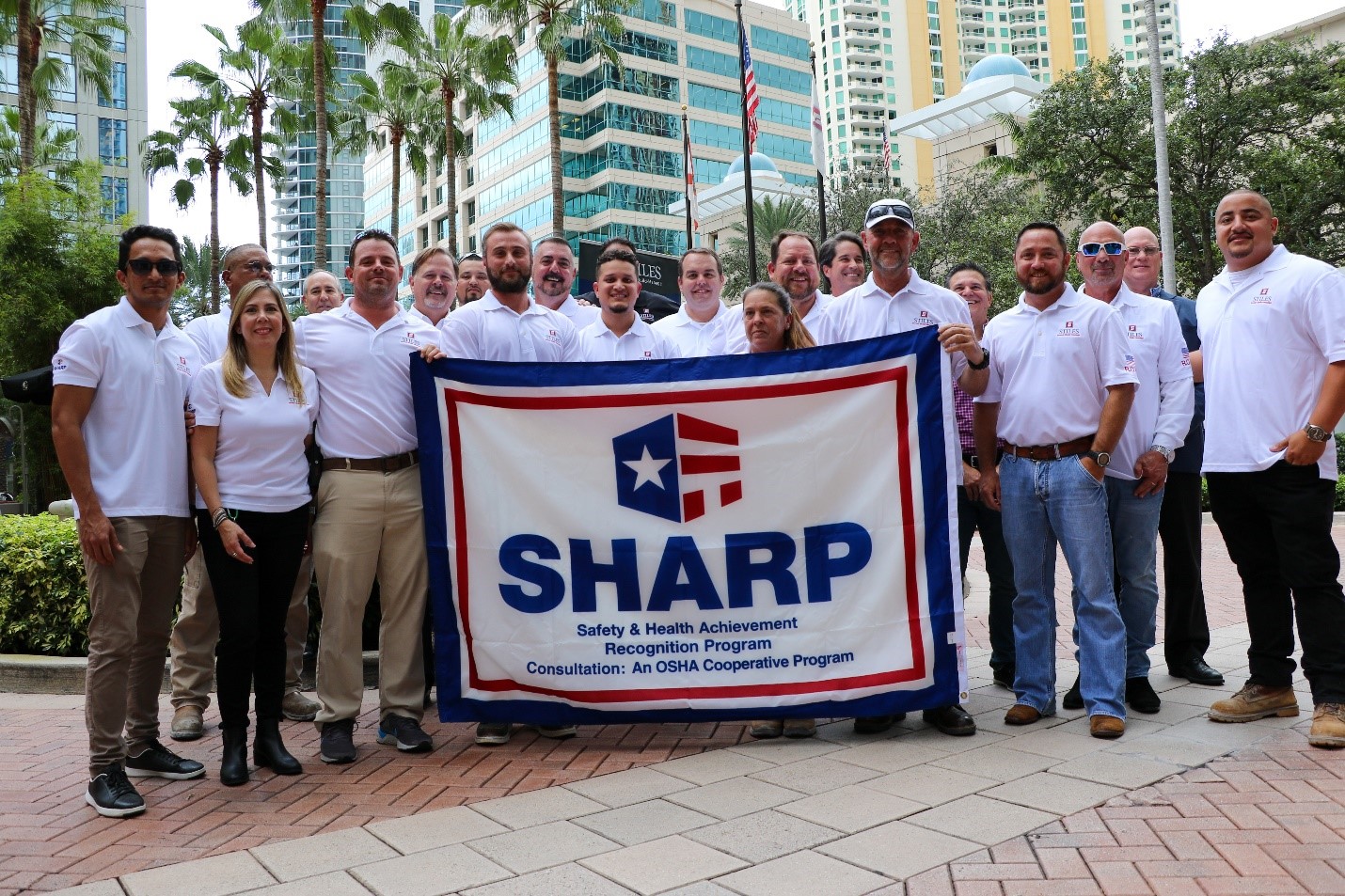 Stiles Construction Team on the R.O.L.O. project with SHARP Flag