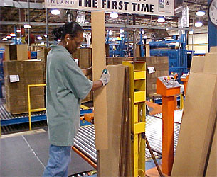 Figure 2: Employee bending the sheet