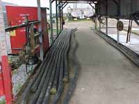 Figure 43: Tripping hazard eliminated by proper storage of hoses.