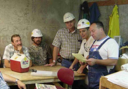 AMEC contractor employees attend one of the weekly "Tool Box Talks."