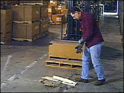 Figure 4. Get off the forklift and remove the obstruction.