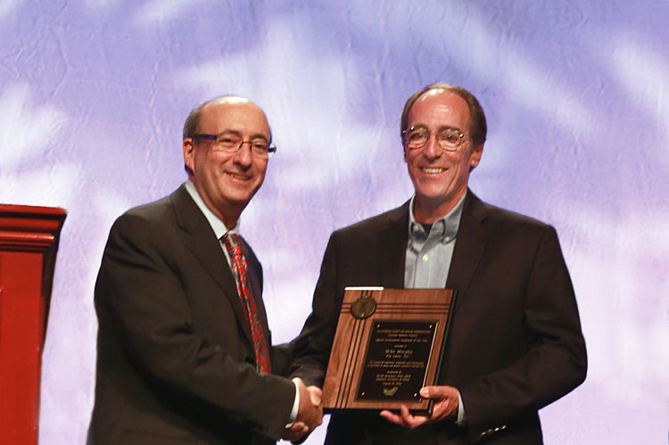 Then-Assistant Secretary of Labor Dr. Michaels, PhD, MPH., presenting SGE award winner to Mike Murphy Ply Gem Inc., Kearney, MO