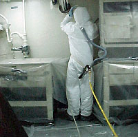 Figure 13: Worker using proper PPE for spray painting