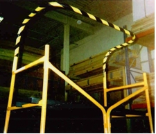 Companion Rail Attachment pinned to upper frame support of mobile scaffolds, side view