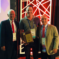 Michael Courouleau, BakerHughes, a GE Company, St. Rose, Louisiana with Directorate of Cooperative and State Programs Director, Douglas J. Kalinowski, and Region VIII VPP Manager, Brad Baptiste