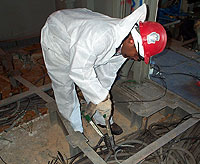 Figure 5: Worker removing cable with cable cutters