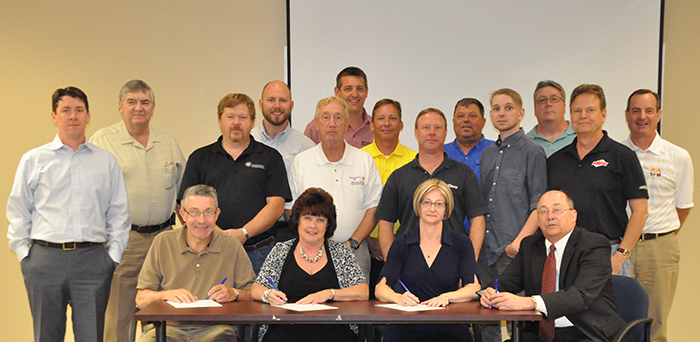 Members of the ABC Delaware Safety, Health & Wellness Committee pose with the signatories at the alliance signing ceremony on June 15, 2016. (standing, left to right): Members of the ABC Delaware Safety, Health & Wellness Committee: Jake Czerwin-Advanced Power Control, Richard Eitel-Pearce & Moretto, Mike Anderson-Nickle Electrical Companies, Brian Martinenza-Service Unlimited, Frank Dobson-Dobson Associates, Giff Nowland-Nowland Associates, Craig Campbell-Bramhall Hitchen Insurance, Todd Moran-M. Davis, Marc Klair-RC Fabricators, Brian Eppelheimer-J.F. Sobieski Mechanical, Eric Charlebois-Wohlsen Construction, David Eppelheimer-J.F. Sobieski Mechanical, and Scott Baker-The Tri-M Group. (seated, left to right): Fred Eysaldt-OSHA Supervisor; Marie Wright-ABC Delaware Safety, Health & Wellness Committee Chair; Erin Patterson-OSHA Area Director; and Ed Capodanno, ABC Delaware President.