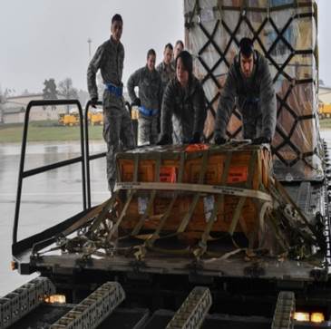 Airmen on a loader