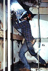 Figure 6: Welder with air-line respirator