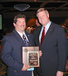 Former-Assistant Secretary Edwin G. Foulke, Jr., presenting SGE award to Brian Bennett