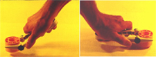 Figure 1. Bent-handled tools help maintain straight wrist postures (left panel) as opposed to bending the wrist to use straight handed tools (right panel).