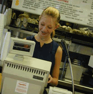 Worker at register