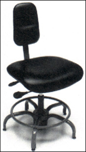 Fig. 2  Padded chair with rounded, waterfall edge. Narrow back rest is ideal for twisting jobs.