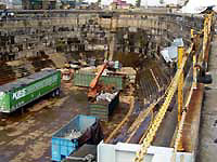 Figure 1: Dry dock area kept uncluttered by use of numerous recycle and trash bins