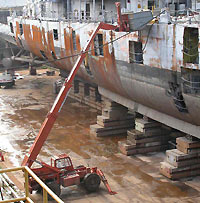 Figure 2: JLG used to move scrap off vessel