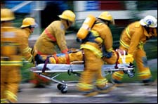 Rescue workers helping a victim