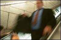 Blurred image of people going down stairs