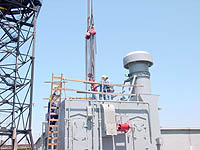 Figure 4: Riggers on elevated work surface protected by guard rails