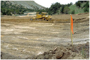 Figure 2. Excavating the drill site. Photo Credit: OSHA (original eTool image)