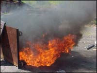 Figure 2. Training fire being extinguished by handheld fire extinguisher.