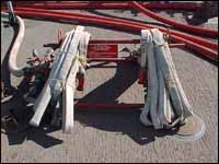 Figure 5. Figure 5. 1½ inch fire hose ready to be charged on main deck of vessel.