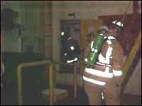 Figure 3. Fireman training in low light conditions in an enclosed space on vessel.