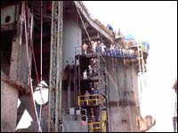 Figure 5. Workers exiting vessel during evacuation drill.