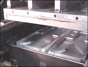 Figure 10. Top and bottom forming dye press components.