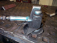 Figure 9: Hand held grinder with guard