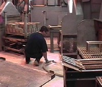 Figure 2. Vacuuming lead oxide on the floor