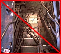 Figure 2: Improper practice - Stair exit route impeded by hoses and cables