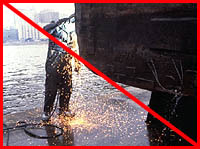 Figure 5: Improper practice - Worker above edge of water must use PFD