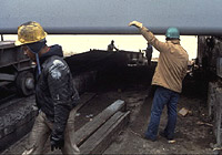 Figure 3: Signal person assisting crane operator when view of load is obstructed