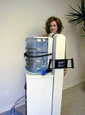 Fig. 19: bottle is safely loaded onto water cooler