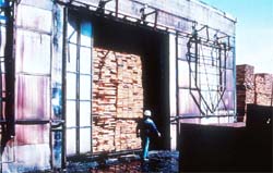 Lumber piles loaded in dry kiln