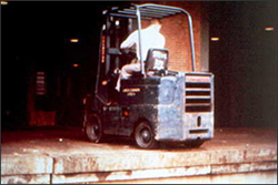 Figure 1. Always look in the direction of travel. Be careful at the edges of the loading docks.