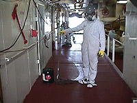 Figure 4: Workers protected from toxic cleaning solvents