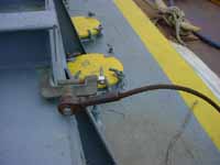 Figure 4: Barge grounding clamp and cable.