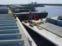 Figure 9: Mooring the barge and standing away from the edge.