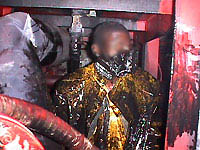 Figure 29: Worker exposed to skin and eye contact hazards from cleaners and residues.