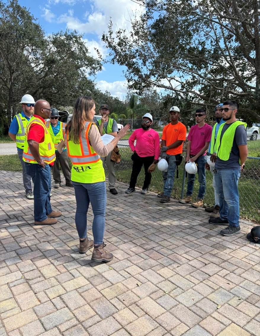 Workers wearing safety equipment