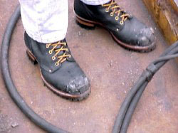 Figure 1: Worker with foot protection