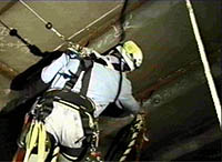 Figure 1: Worker protected with a retractable lifeline and body harness