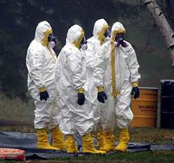 Figure 2: Workers dressed for corrosive cleaning