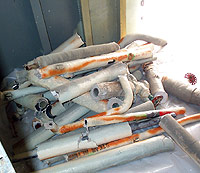 Figure 2: Ship's piping coated with asbestos.