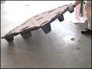 Figure 48. Plastic pallets weigh between 20 and 30 pounds.